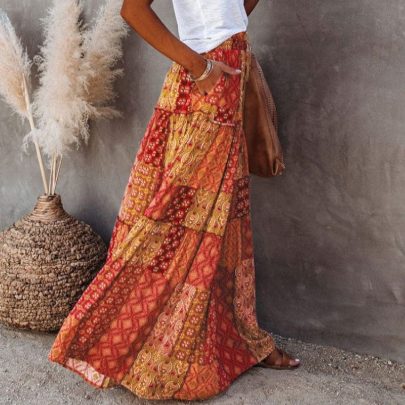 Breezy A-line tiered floral maxi skirt for women, high elastic waist, casual summer vacation wear.