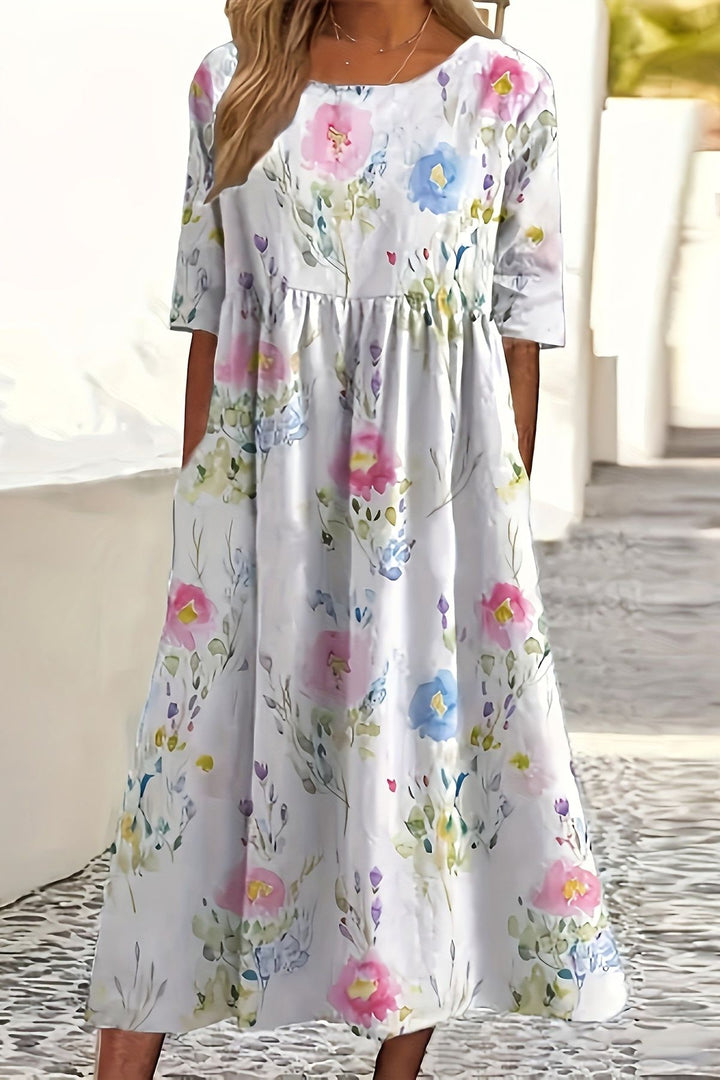Women's tiered ruffle midi dress, comfortable & stylish for spring and summer casual wear. Elegant everyday fashion.