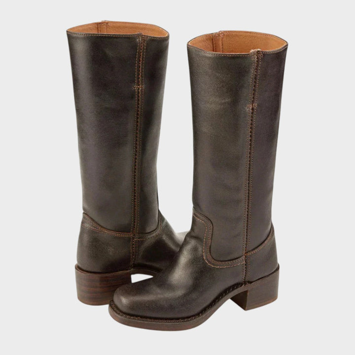 Women's timeless equestrian riding boots in dark brown, featuring a comfortable knee-high design and stylish block heel.