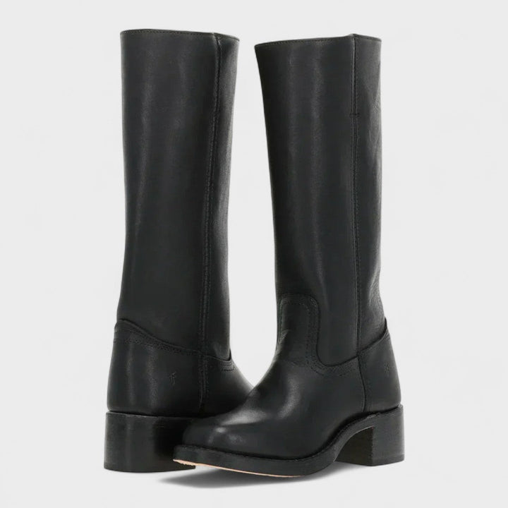 Comfortable timeless black women's equestrian boots, knee-high design with a sturdy block heel for versatile winter style.