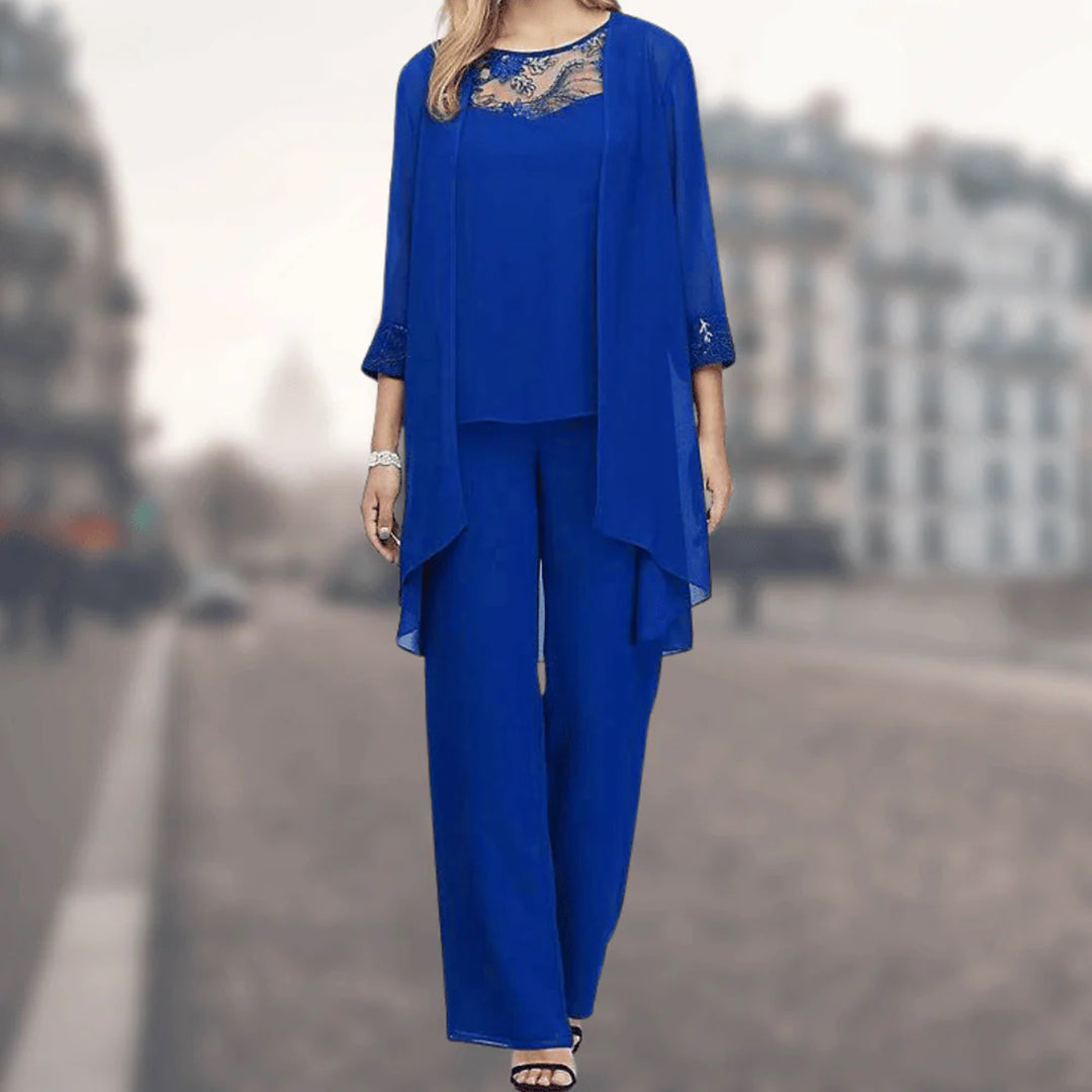 Soft, flowy women's two-piece outfit set, featuring a stylish top & comfortable wide-leg pants for a modern look.