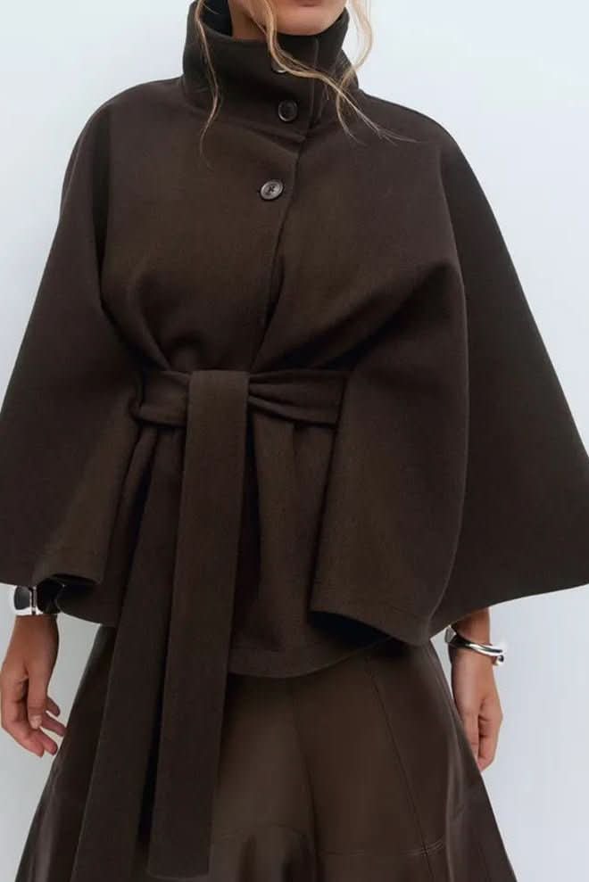 Modern women's self-tie cape, oversized fit. Timeless elegant outerwear for sophisticated style.