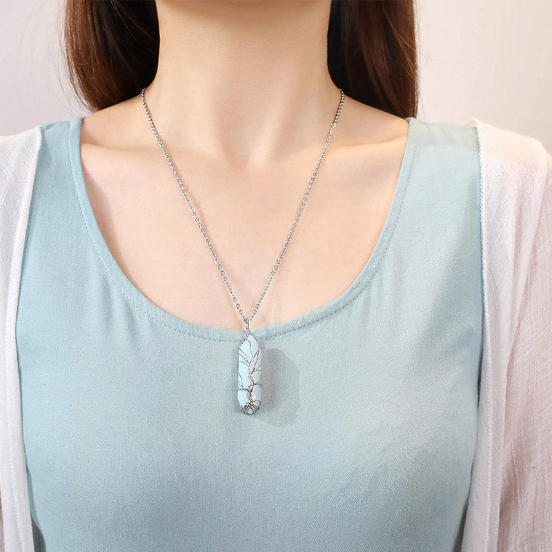Women's meaningful gift: Tree of Life necklace with crystal and healing gemstone.