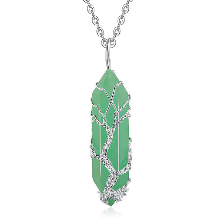 Elegant Tree of Life pendant with a sparkling crystal and natural gemstone for women.