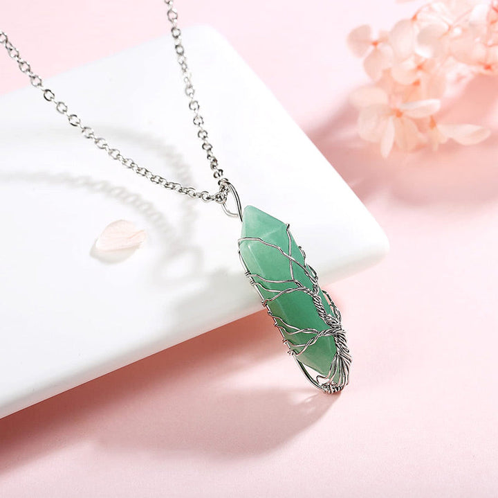 Spiritual Tree of Life necklace for women, featuring a vibrant crystal gemstone.