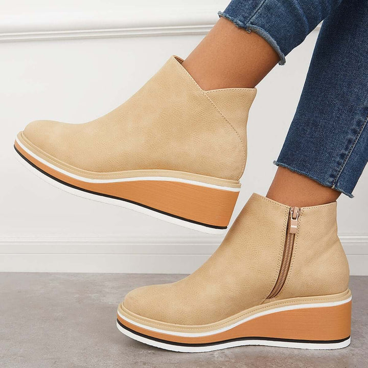Fall fashion women's platform ankle boots, boasting a trendy zipper & comfortable sole.