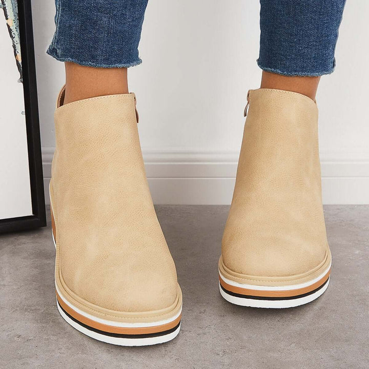 Sleek women's platform boots, ankle-high with a chic zipper & modern trendy appeal.
