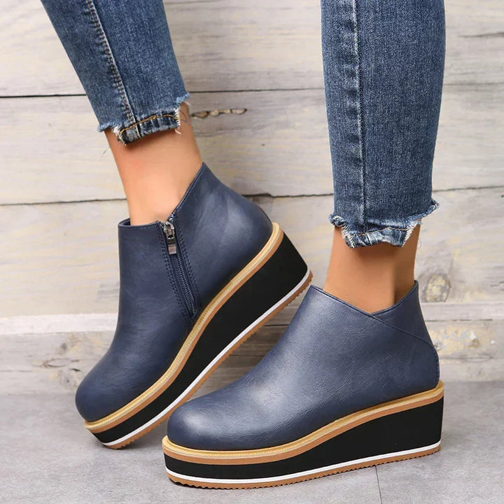 Practical women's zipper boots: ankle style, comfortable platform, ideal for everyday.