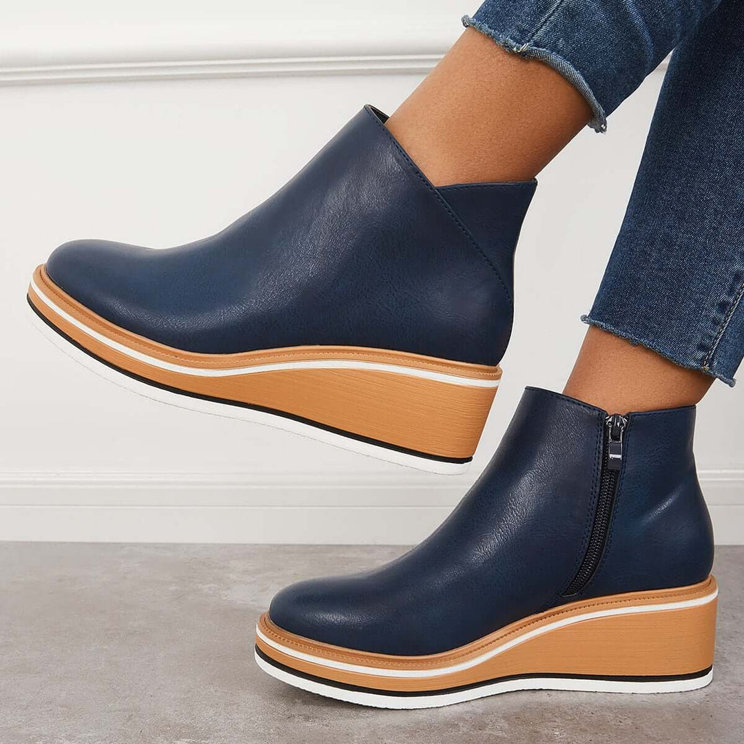 Chic women's zipper ankle boots, featuring a platform sole for added height & fashion.