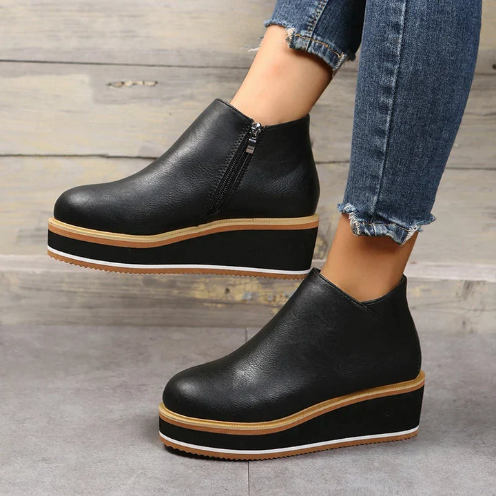 Trendy women's casual ankle boots, featuring a comfortable platform sole & easy zipper.