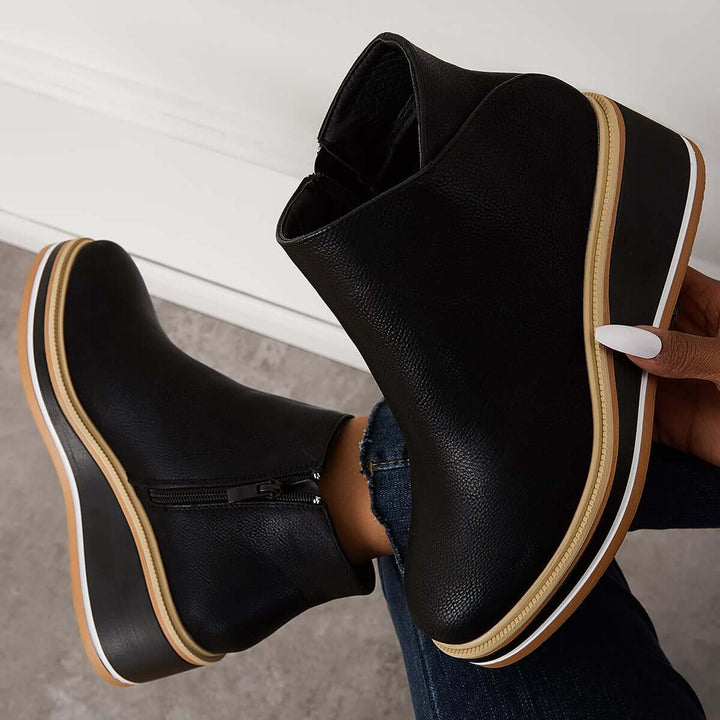 Comfortable women's platform zipper boots, ankle-length, ideal for all-day wear & style.