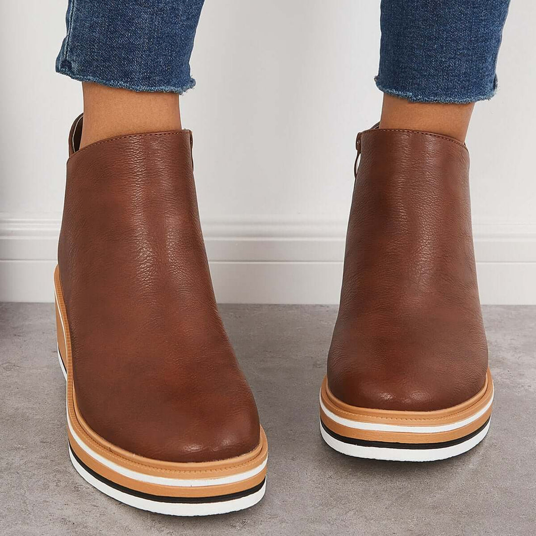 Comfortable women's ankle boots with a trendy platform sole & easy-access side zipper.