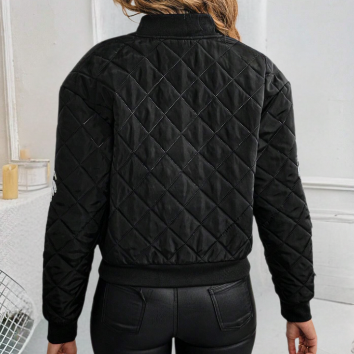 Rivka black bomber jacket for women, trendy zip-up outerwear, suitable for spring, fall, & layering fashion.