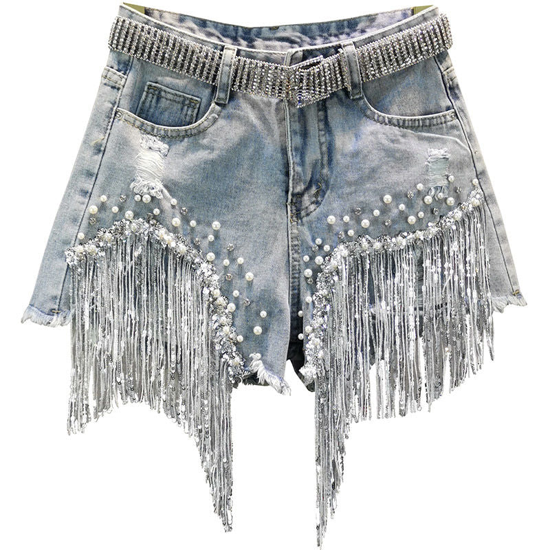Women's trendy blue denim shorts with stylish tassel fringe, perfect for summer casual wear.