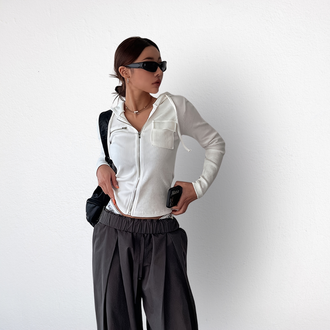 Women's trendy cropped hoodie, a comfortable pullover perfect for casual spring and summer layering style.