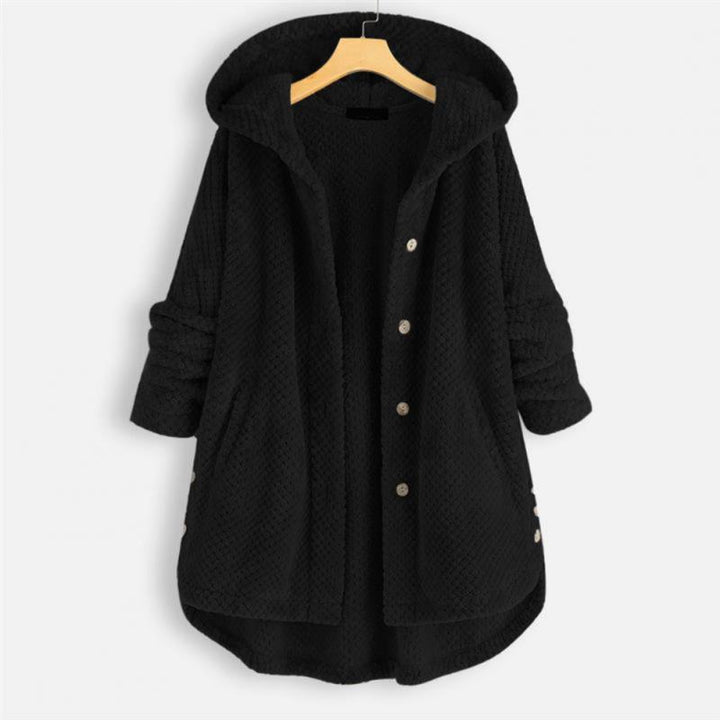 Trendy women's hooded fleece jacket with a modern cut. Reversible for versatile, casual everyday wear.