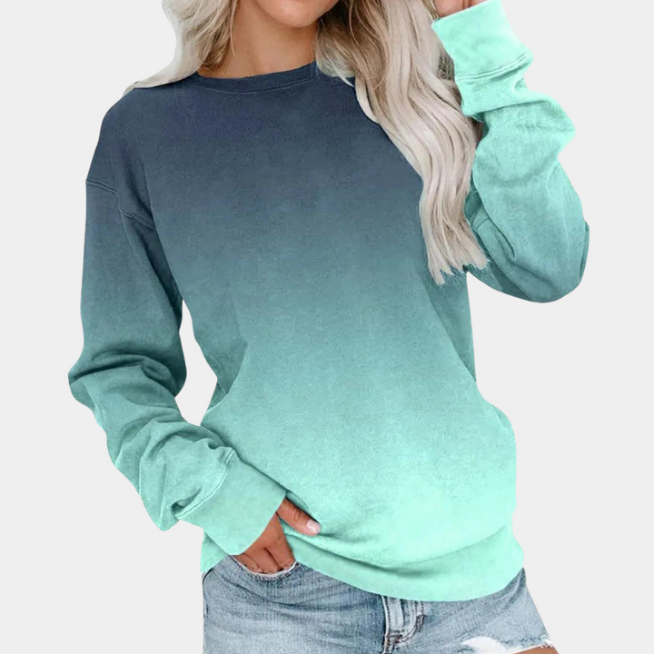 Modern women's gradient top, a chic long sleeve sweatshirt ideal for fall and winter comfort & style.