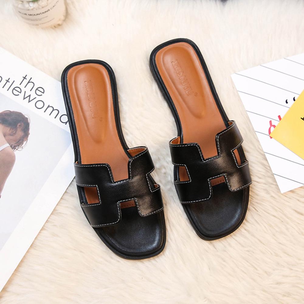 Women's trendy H-profile slide sandals, perfect for stylish comfort and summer fashion.