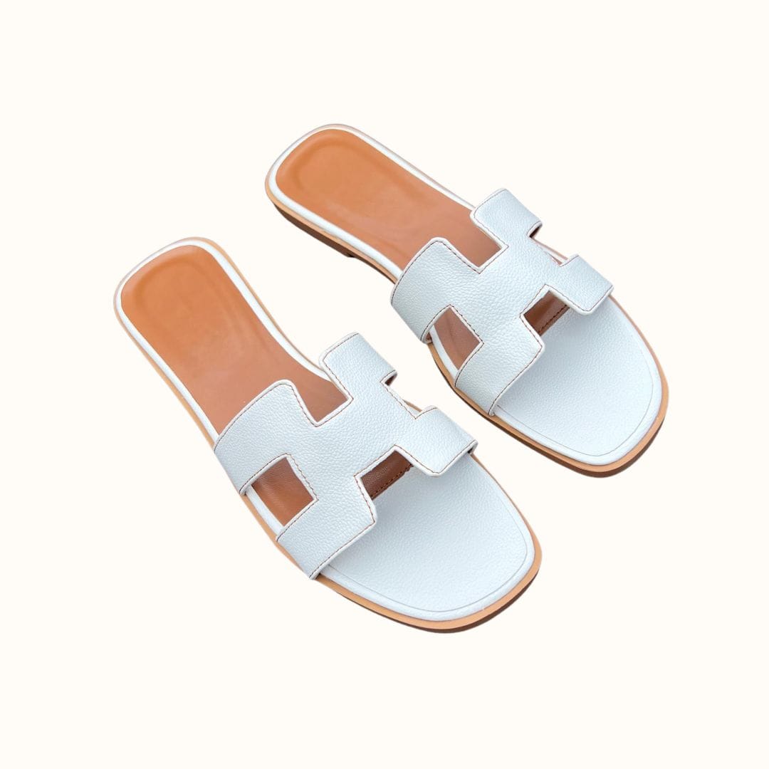 Women's H-profile slide sandals, comfortable, trendy, and chic open-toe summer footwear.
