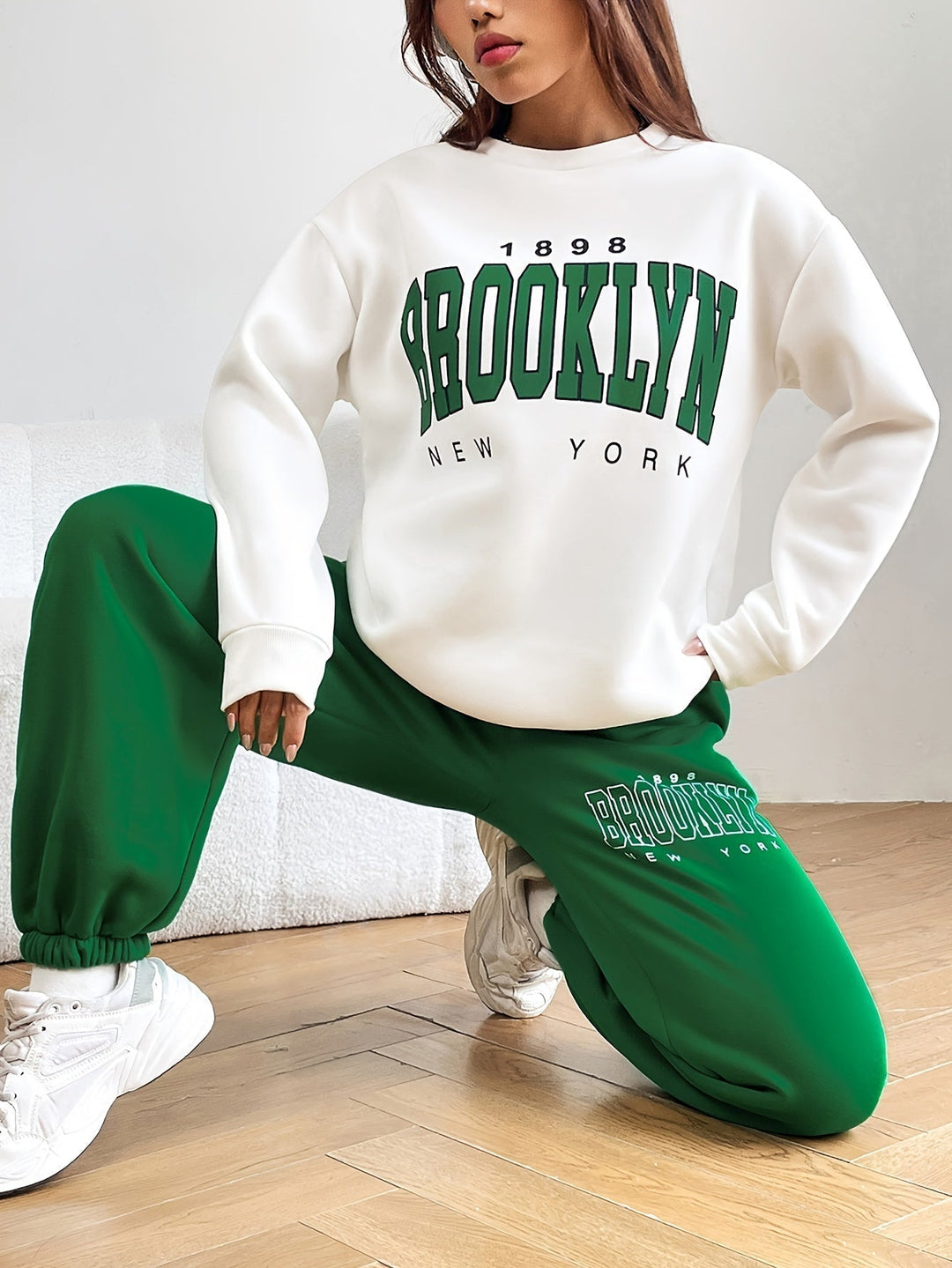 Women's trendy letter print two-piece jogging suit, perfect for casual wear and comfort.