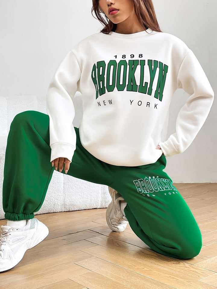 Women's trendy letter print two-piece jogging suit, perfect for casual wear and comfort.