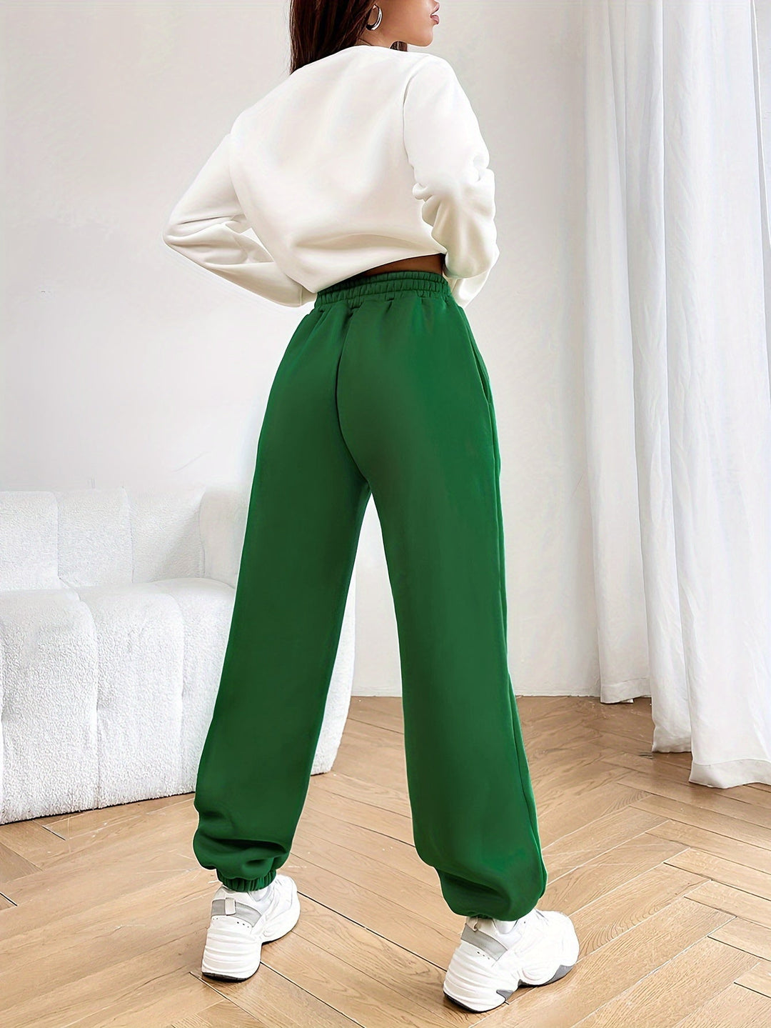 Fashionable women's two-piece jogging suit, letter print tracksuit. Comfortable & stylish activewear set.