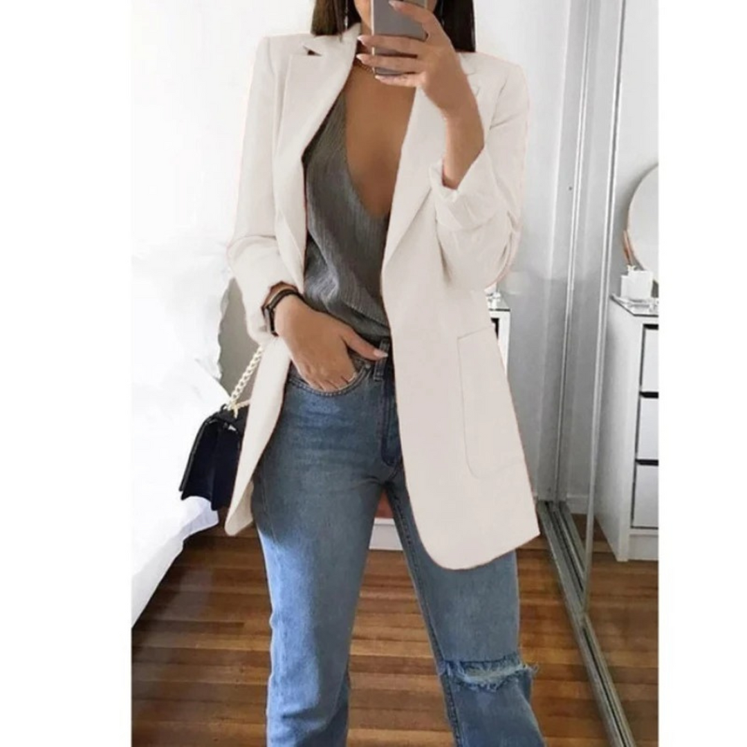 Modern women's long blazer, offering a chic and effortless style for any occasion.