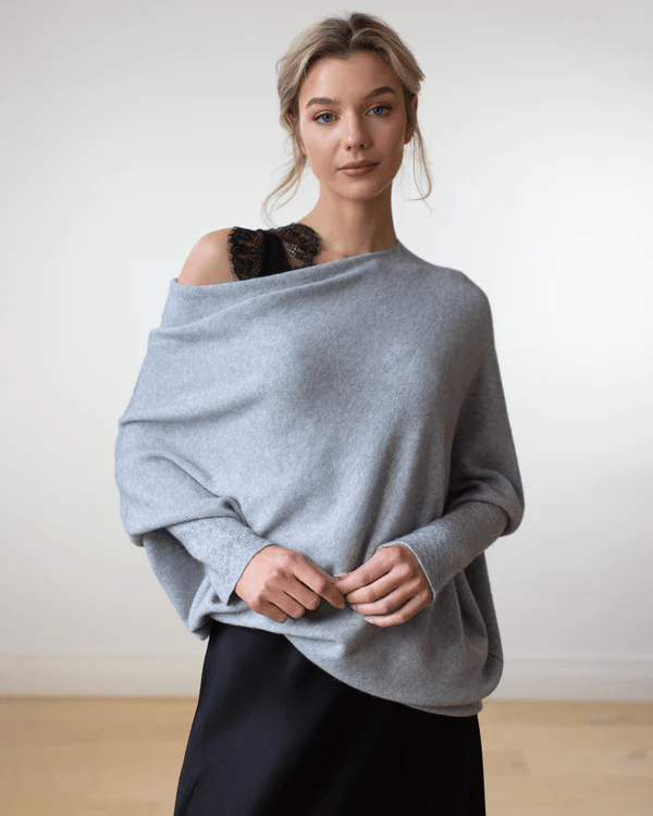 Women's trendy off-shoulder sweater, elegant comfort knitwear.