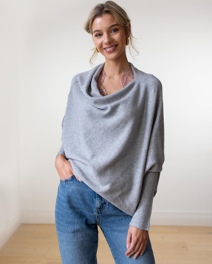 Stylish women's off-shoulder long-sleeve top for fall & winter fashion.