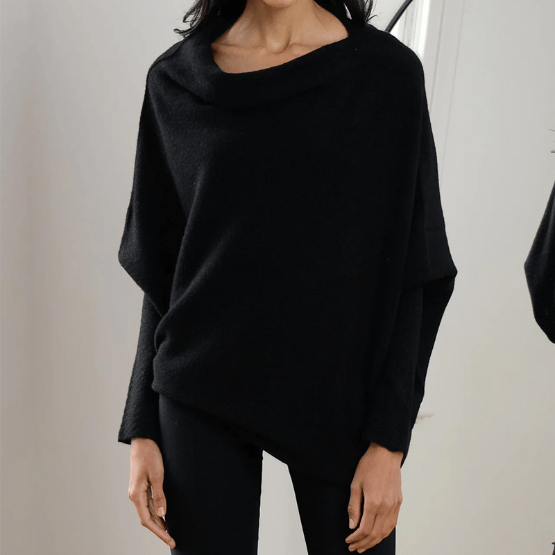 Soft knit off-shoulder sweater, offering stylish comfort for women's fall outfits.