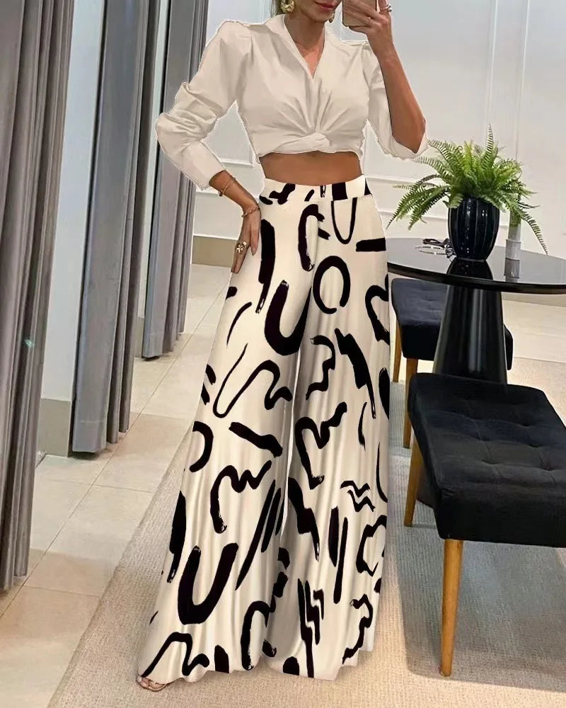 Women's trendy printed wide leg pants, perfect for casual spring & summer fashion. Comfortable, flowy design.