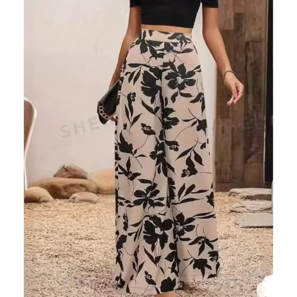 Boho chic women's wide leg pants with a vibrant print. Loose fit, comfortable, and perfect for summer fashion.