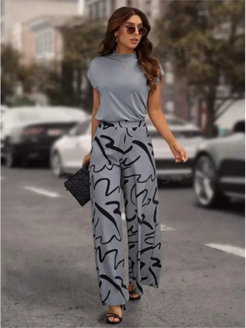 Women's comfortable printed wide leg pants for summer fashion. Loose fit, flowy, and a stylish casual trouser.