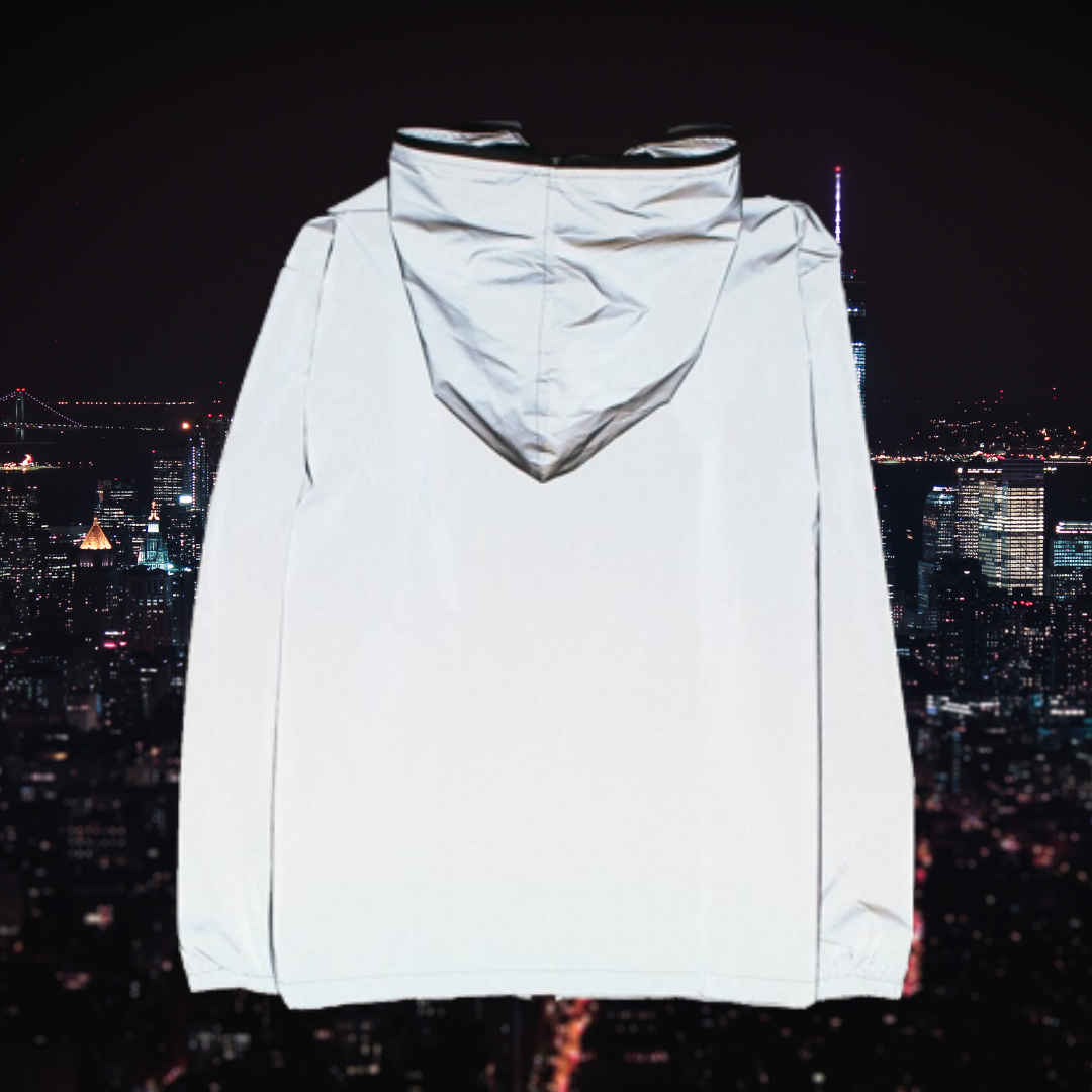 Fashionable women's reflective coat with high visibility design. Trendy all-season outerwear for safety & style.