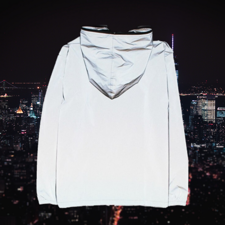 Fashionable women's reflective coat with high visibility design. Trendy all-season outerwear for safety & style.