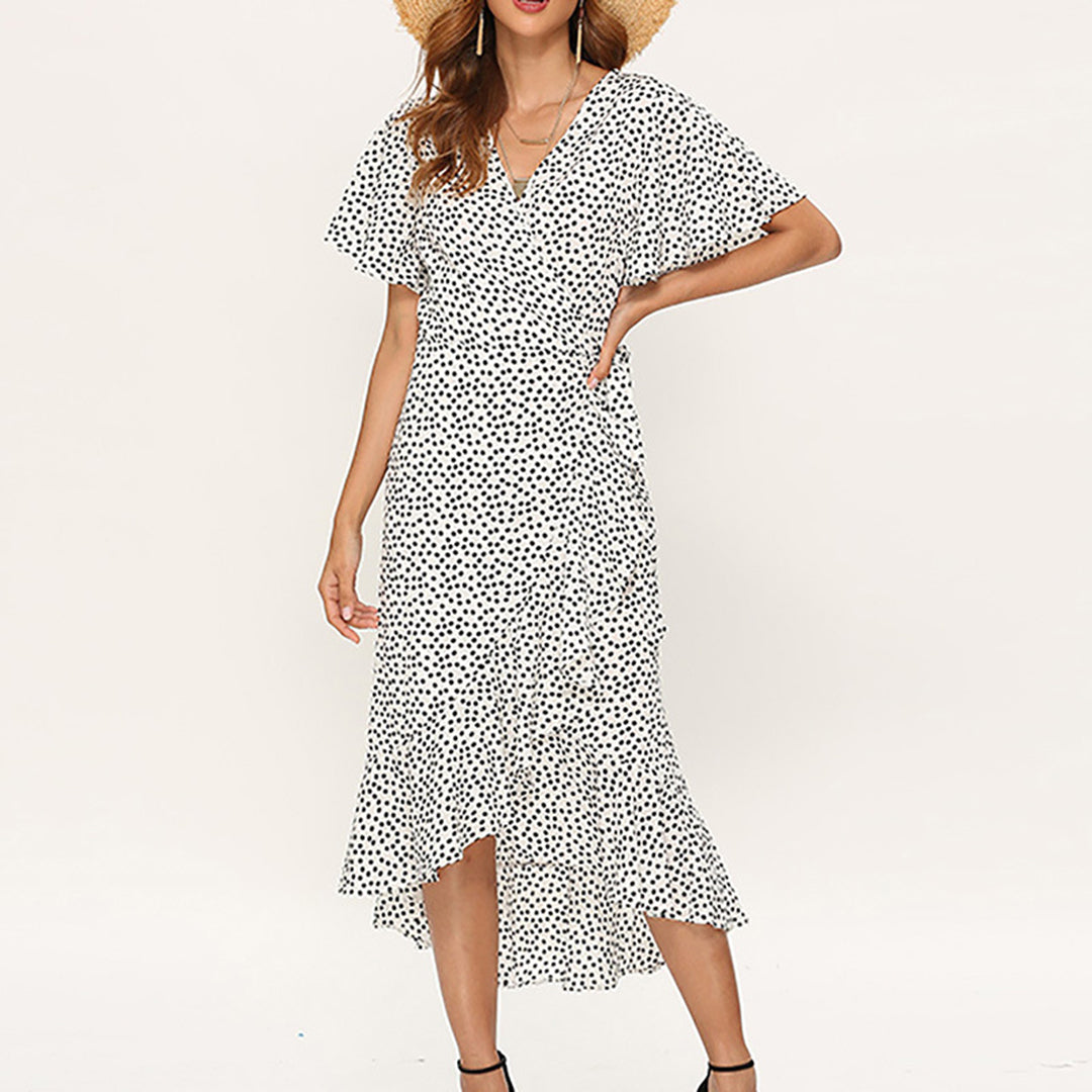 Effortless women's printed summer dress, a versatile wrap style for casual or vacation wear.
