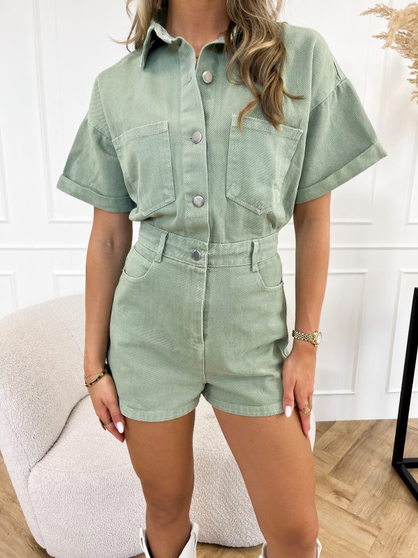 Versatile women's short-sleeve denim romper, perfect for casual wear with its stylish shirt design and relaxed fit.