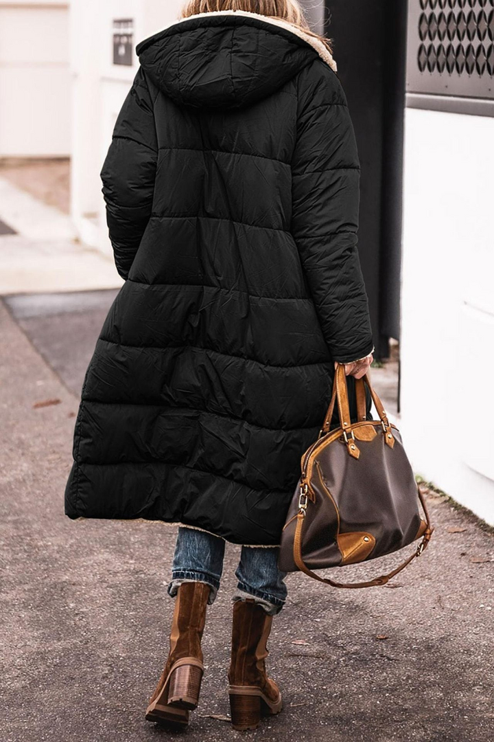 Versatile Sofia women's winter coat, reversible design, perfect for cold weather.