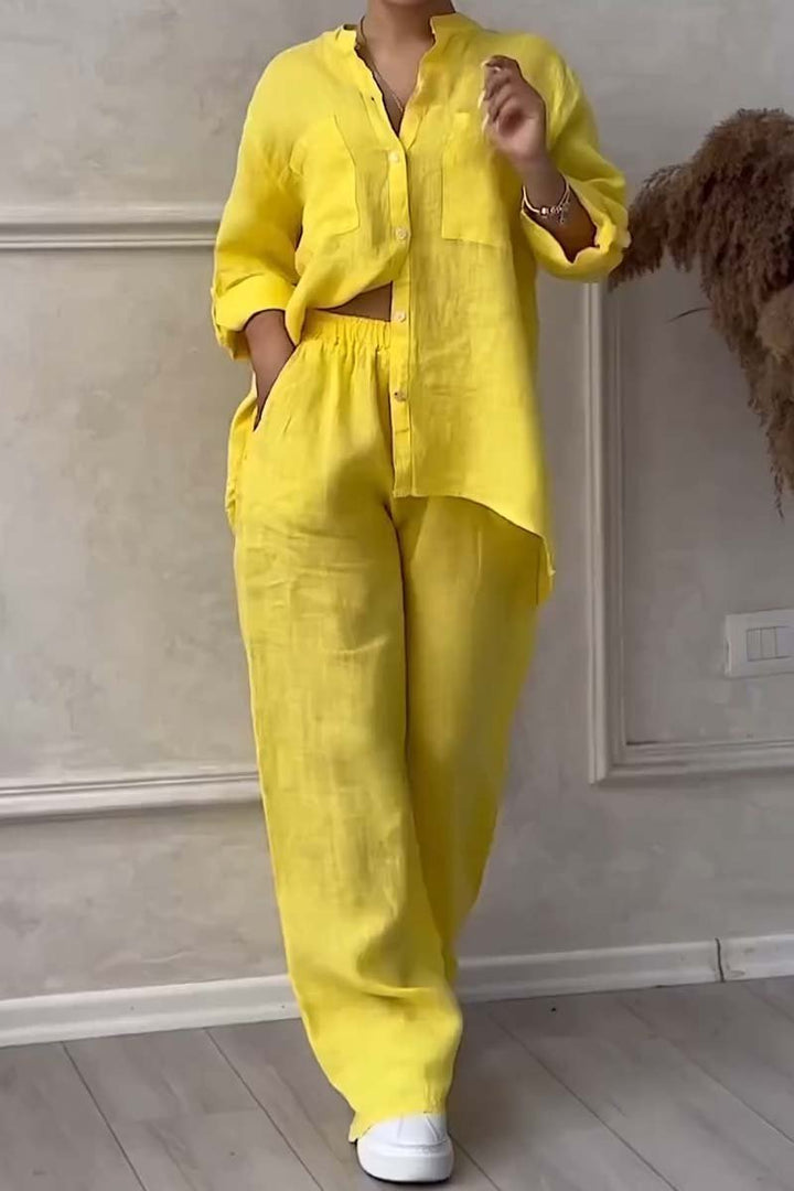 Women's trendy two-piece set: stylish blouse and comfortable wide-leg trousers for casual wear.