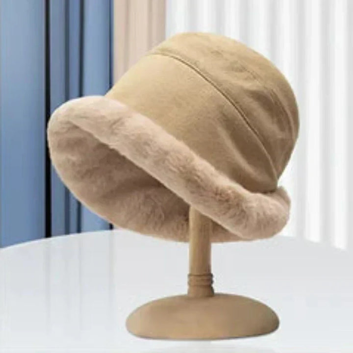 Women's trendy winter hat, fleece-lined for ultimate warmth in cold weather. Chic faux fur fashion accessory.