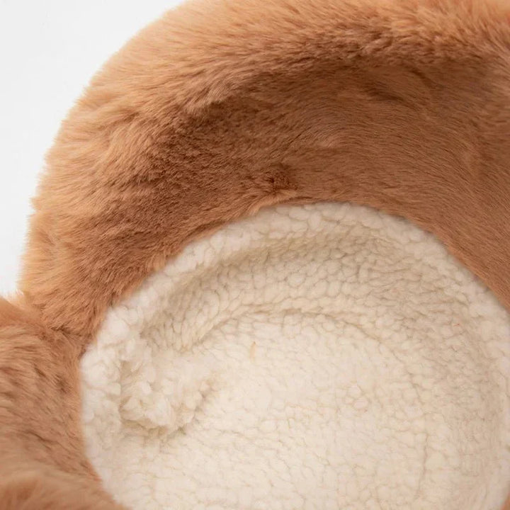 Chic women's winter hat, fleece-lined for warmth, with stylish faux fur details. A must-have headwear.