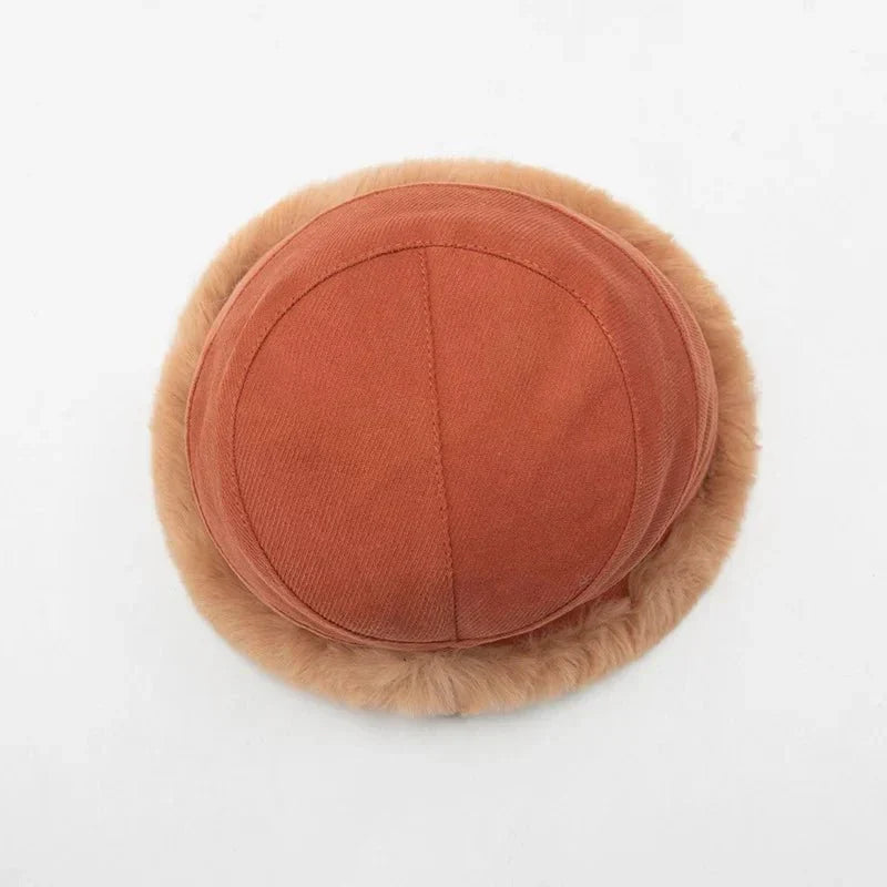 Fashionable women's winter hat, fleece-lined for ultimate warmth. Perfect cozy faux fur accessory for cold weather.