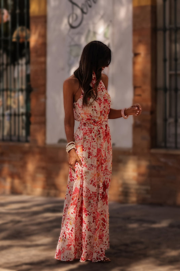 Vibrant women's tropical print maxi dress, a chic halter style ideal for elegant vacation and summer events.