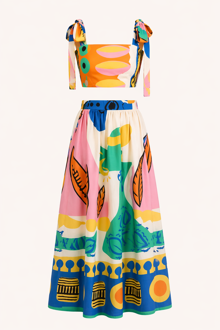 Elegant women's tropical print two-piece: sleeveless crop top & high-waist flowing maxi skirt for resort wear.