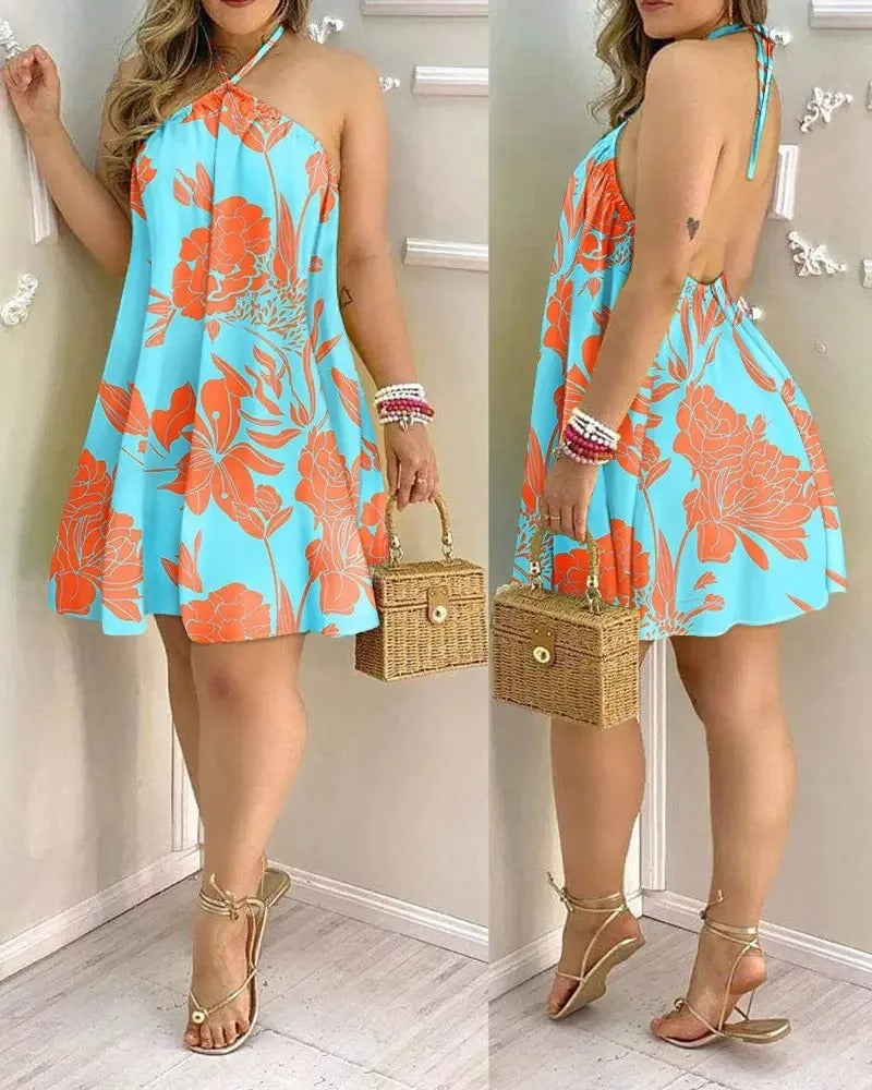 Women's beach dress: tropical print, halter neckline, and backless for ultimate summer style