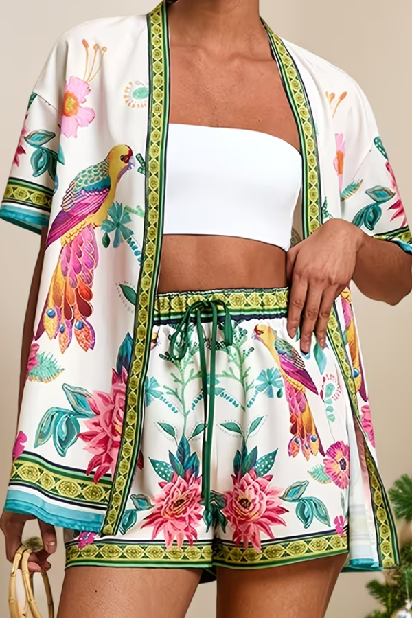 Women's tropical print two-piece shorts set, perfect for summer vacations & beachwear.
