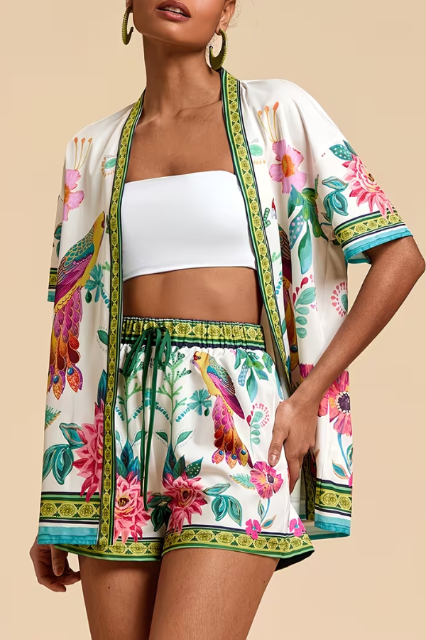 Stylish women's tropical floral print matching shorts set, ideal for resort wear.