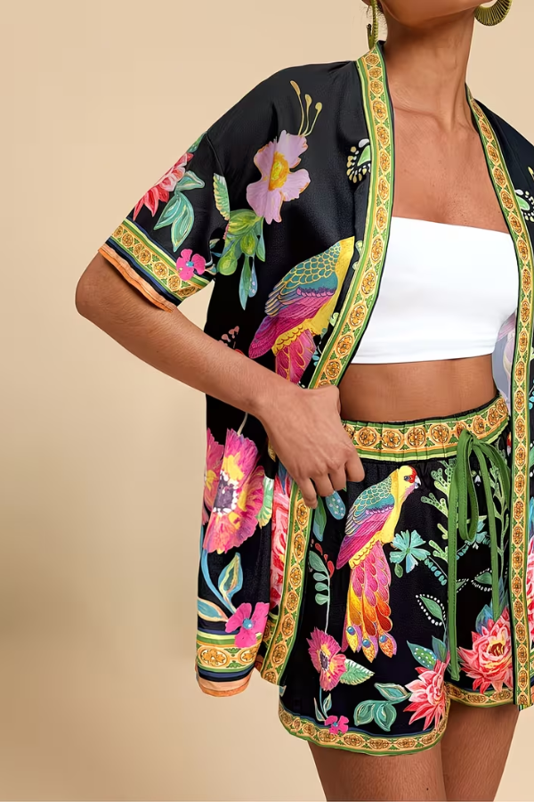 Vibrant women's tropical print short sleeve top & shorts matching set.