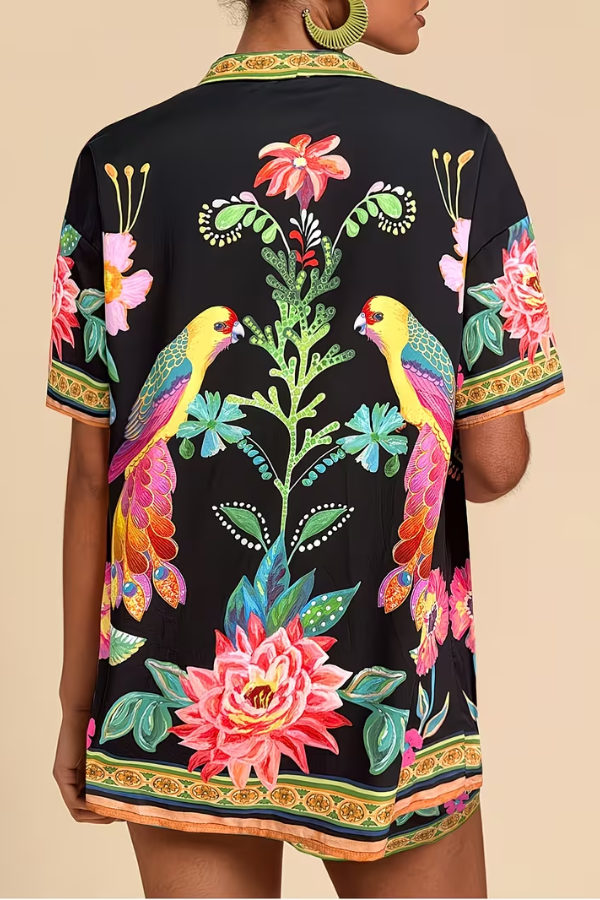 Chic women's tropical print two-piece summer outfit, perfect for beach & resort style.