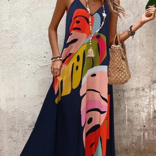 Flowing sleeveless tropical maxi dress for women, offering comfort and style for summer, beach, and casual wear.